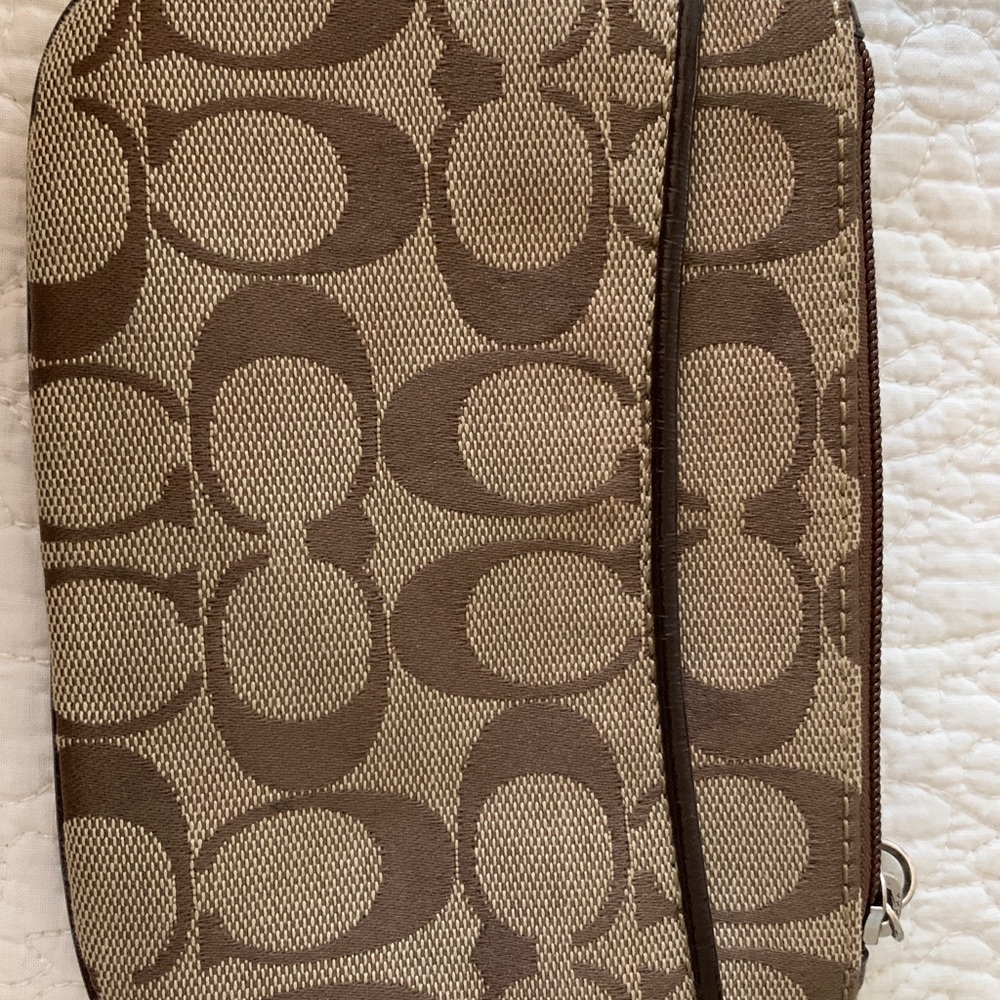 Coach wristlet.  Brown with C logo.